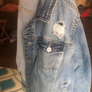 Distressed denim jacket